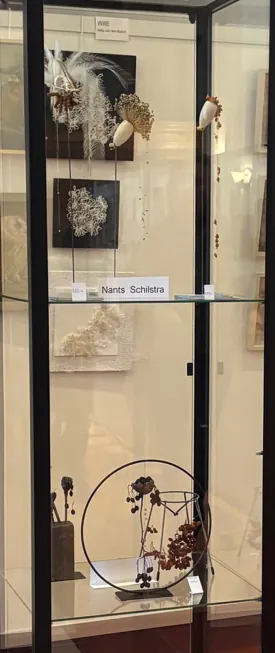 Display case with several #fragiles pieces and a nameplate reading Nants Schilstra